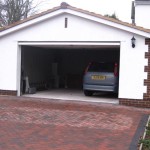 New double garage paved driveway