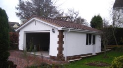 New double garage paved driveway